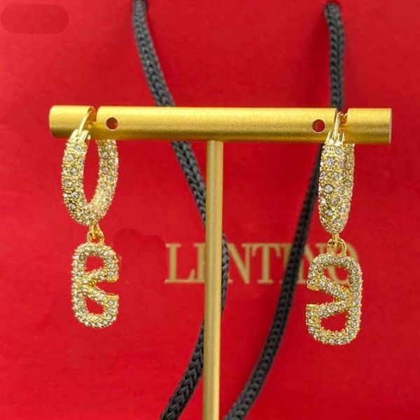 designer earrings valentino luxury round v-letter rhinestone brass material silver needle earstuds fashion versatile earrings for women acce, Golden
designer earrings valentino luxury round v-letter rhinestone brass material silver needle earstuds fashion versatile earrings for women acce, Golden