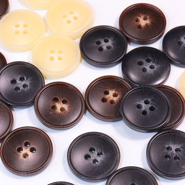 Two eye button, wide edge button, four eye fine edge lining, trench coat button, resin button accessories
Two eye button, wide edge button, four eye fine edge lining, trench coat button, resin button accessories
