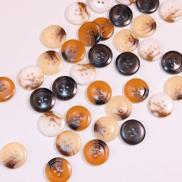 Two eye bread buttons, wide edge buttons, four eye fine edge lining, trench coat buttons, resin button accessories
Two eye bread buttons, wide edge buttons, four eye fine edge lining, trench coat buttons, resin button accessories