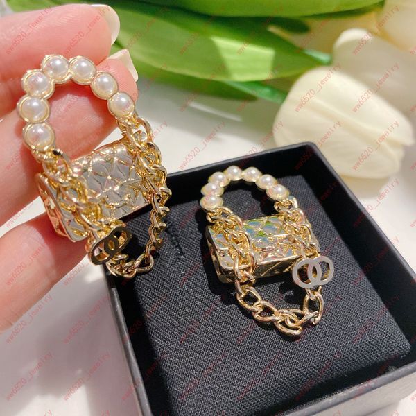 designer bag earrings, embed pearls alphabet luxury fashion charm women accessories, weddings, banquets. christmas, valentine's day, gi, Golden
designer bag earrings, embed pearls alphabet luxury fashion charm women accessories, weddings, banquets. christmas, valentine's day, gi, Golden