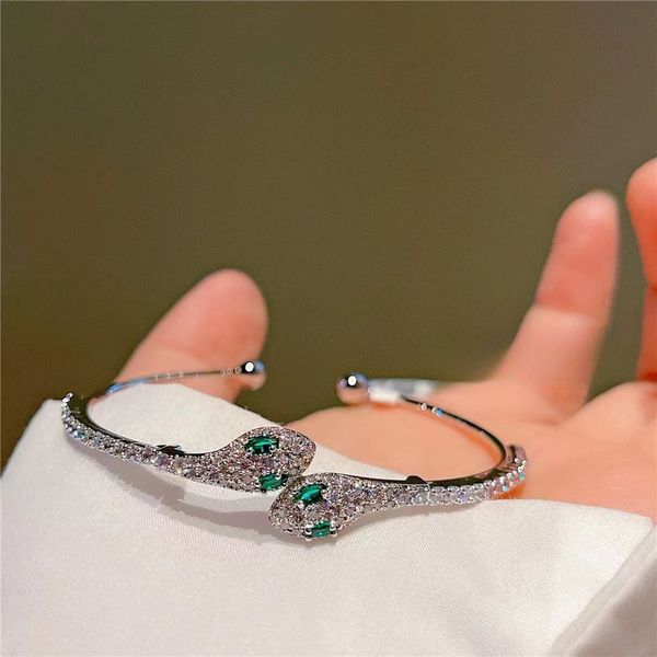 jewelry designer bracelet light luxury green cobra snake shaped zircon bracelet super sparkling opening personalized design bracelet, Golden;silver
jewelry designer bracelet light luxury green cobra snake shaped zircon bracelet super sparkling opening personalized design bracelet, Golden;silver