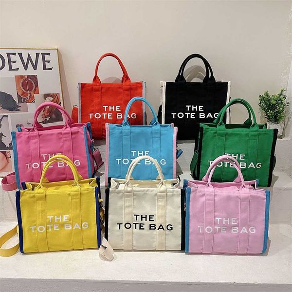 luxury handbags sale new summer tote simple solid color letter women's hand commuting large capacity messenger canvas bag
luxury handbags sale new summer tote simple solid color letter women's hand commuting large capacity messenger canvas bag
