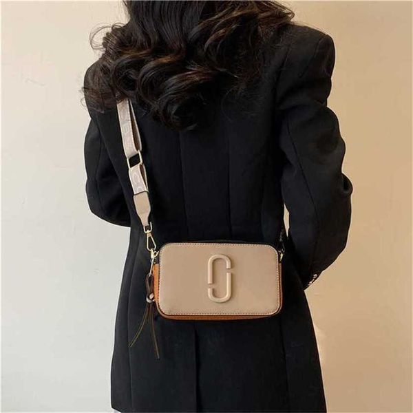 22% off bag 2024 new launch designer handbag design camera contrast color small square versatile wide strap single for women
22% off bag 2024 new launch designer handbag design camera contrast color small square versatile wide strap single for women
