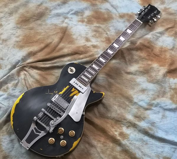 custom electric guitar old black worn aged guitar, mother of pearl inlay, solid thick maple cap, viabrato
custom electric guitar old black worn aged guitar, mother of pearl inlay, solid thick maple cap, viabrato