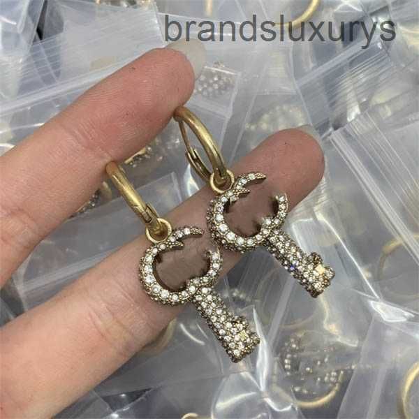 retro stud ggity designer charm gold earrings double letter g eardrop women party accessories earring with box 5643, Golden;silver
retro stud ggity designer charm gold earrings double letter g eardrop women party accessories earring with box 5643, Golden;silver