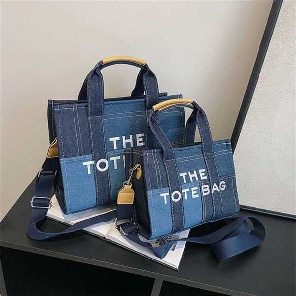 26% off bag 2024 new launch designer handbag hand denim color contrast splicing portable tote high-grade sense minority embroidered letter m
26% off bag 2024 new launch designer handbag hand denim color contrast splicing portable tote high-grade sense minority embroidered letter m