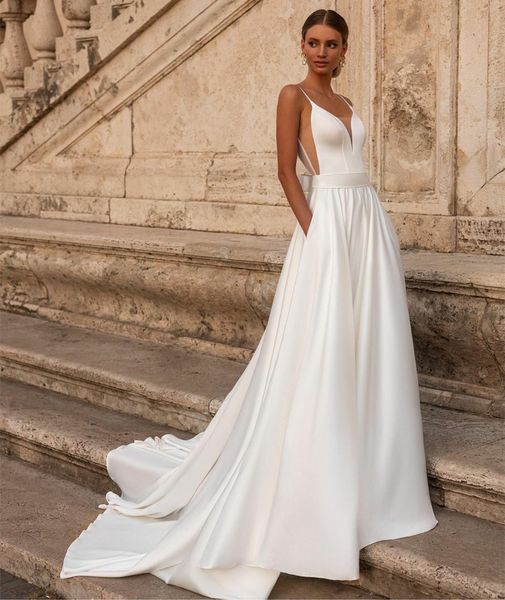 elegant long satin v-neck wedding dresses with pockets a-line ivory spaghetti straps sweep train bridal gowns with bow vestido de novia wome, White
elegant long satin v-neck wedding dresses with pockets a-line ivory spaghetti straps sweep train bridal gowns with bow vestido de novia wome, White