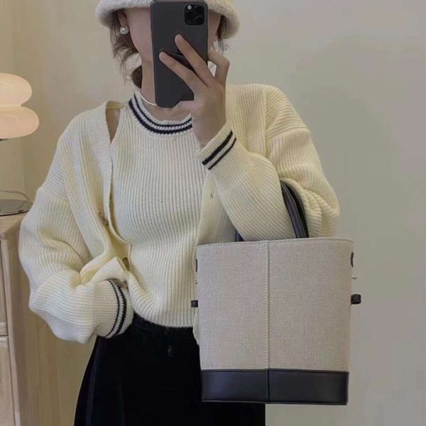 korean casual simple cardigan sweater jacket womens autumn style with a slim all matching vest two piece suit, White;black
korean casual simple cardigan sweater jacket womens autumn style with a slim all matching vest two piece suit, White;black