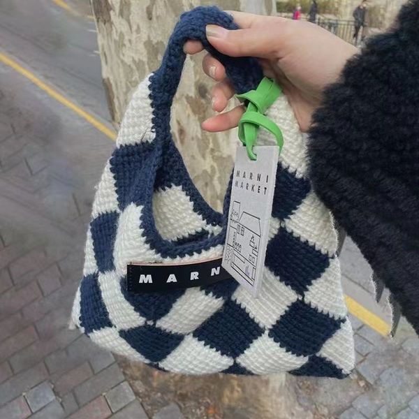 waist bags 2023 autumnwinter lingge contrast knitted handwoven handheld bag fashion woolen plush women's underarm 230828
waist bags 2023 autumnwinter lingge contrast knitted handwoven handheld bag fashion woolen plush women's underarm 230828