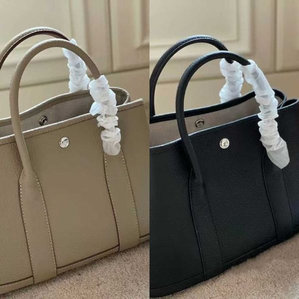 a garden party tote bag shopping totes h cowhide lady handbag fashion shoulder designer highcapacity wallets genuine leather classic retro p
a garden party tote bag shopping totes h cowhide lady handbag fashion shoulder designer highcapacity wallets genuine leather classic retro p