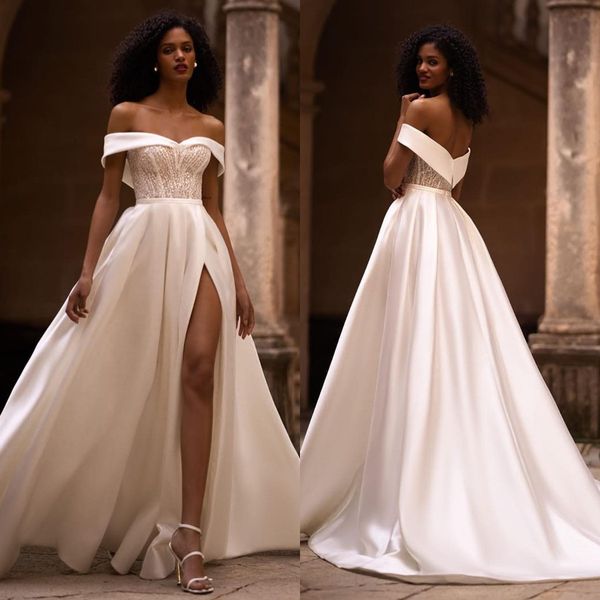boho a line wedding dresses for bride off shoulder satin wedding dress sequins bodice backless split designer bridal gowns, White
boho a line wedding dresses for bride off shoulder satin wedding dress sequins bodice backless split designer bridal gowns, White