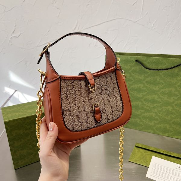 designer bag crystal lizard bag luxury fashion classic style shoulder bag women's handbag with dust bag camel and ebony canvas 011
designer bag crystal lizard bag luxury fashion classic style shoulder bag women's handbag with dust bag camel and ebony canvas 011