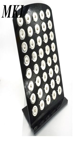 noosa brand mki 18mm snap button display stands fashion black acrylic interchangeable jewelry display board3509547
noosa brand mki 18mm snap button display stands fashion black acrylic interchangeable jewelry display board3509547