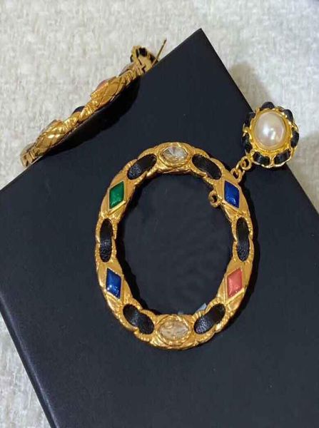 charm hollow round shape drop earring with red and green pearl for women wedding jewelry gift5111623, Golden
charm hollow round shape drop earring with red and green pearl for women wedding jewelry gift5111623, Golden