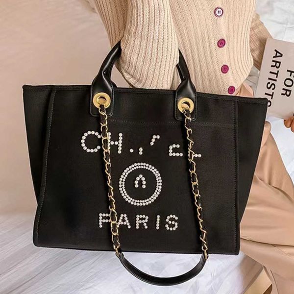 fashion luxury women's beach bags brand ch canvas handbag designer classics backpacks pearl ladies large evening handbags purse women b
fashion luxury women's beach bags brand ch canvas handbag designer classics backpacks pearl ladies large evening handbags purse women b