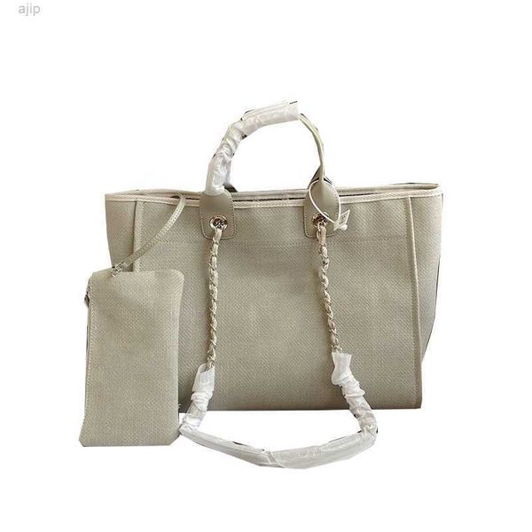 2022ss deauville clutch with chain beach bags canvas large capacity handle totes embroidery letter simple casual france womens designer hand
2022ss deauville clutch with chain beach bags canvas large capacity handle totes embroidery letter simple casual france womens designer hand