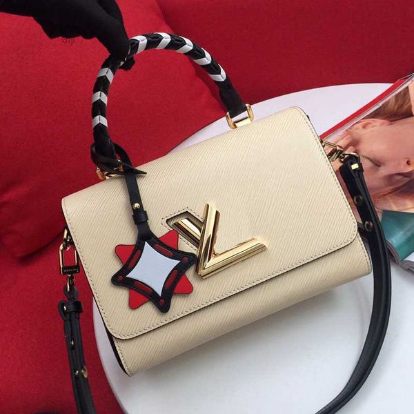 designer genuine leather handbag twists women woven handle shoulder bag crossbody l fashion twill letter rotating flip tote bags
designer genuine leather handbag twists women woven handle shoulder bag crossbody l fashion twill letter rotating flip tote bags