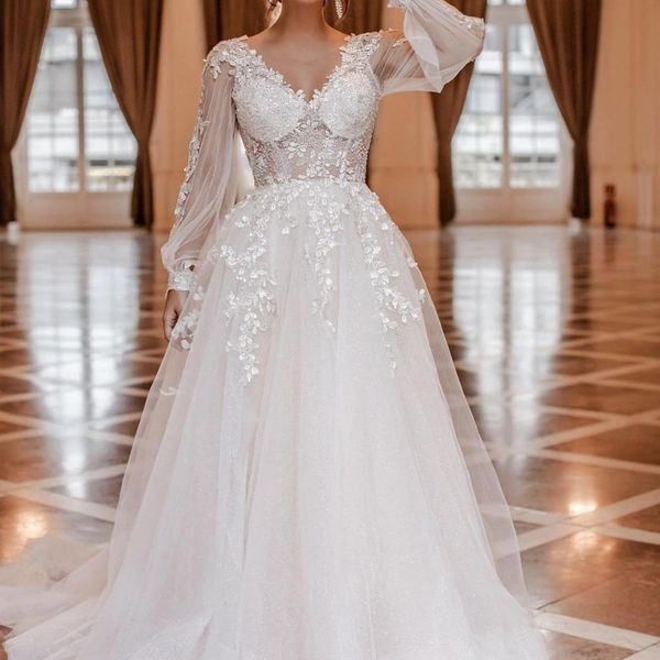 white v-neck backless court train a-line long sleeved wedding dresses graceful appliques flowers beaded princess bride gown
white v-neck backless court train a-line long sleeved wedding dresses graceful appliques flowers beaded princess bride gown