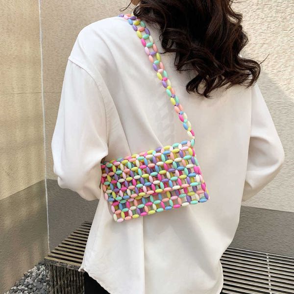 candy colored bag for women with a sense of design niche beaded 2023 new summer woven hollow out sweet and spicy girl underarm 230830
candy colored bag for women with a sense of design niche beaded 2023 new summer woven hollow out sweet and spicy girl underarm 230830