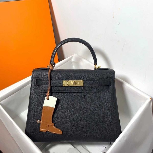 25cm totes brand purse design women bag luxury handbag handmade stitching with wax line togo leather many colors to choose
25cm totes brand purse design women bag luxury handbag handmade stitching with wax line togo leather many colors to choose