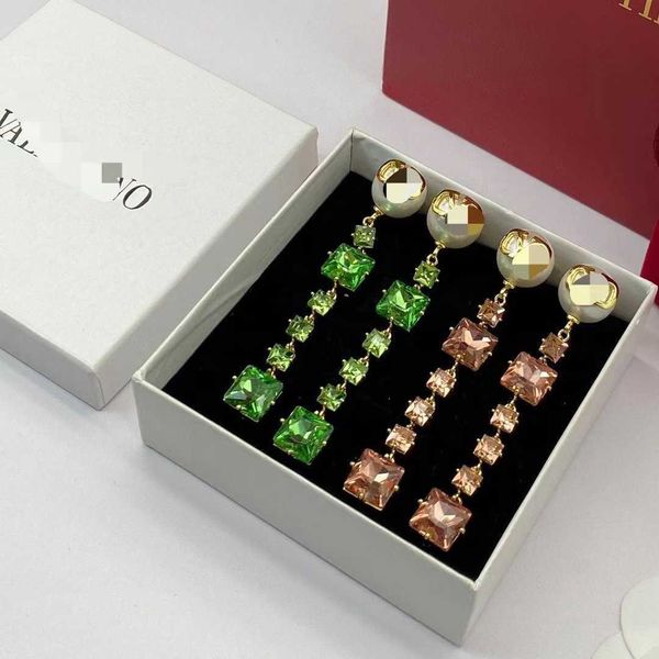 fashion designer valentino square buckle rhinestone long tassel earrings high grade shiny crystal with logo and box, Golden
fashion designer valentino square buckle rhinestone long tassel earrings high grade shiny crystal with logo and box, Golden