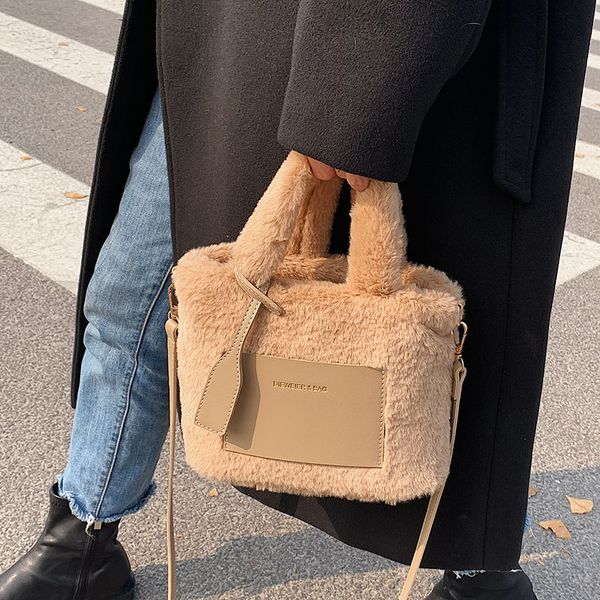 evening bags small faux fur bucket crossbody bag with short handle winter women s designer handbag shoulder 230831
evening bags small faux fur bucket crossbody bag with short handle winter women s designer handbag shoulder 230831