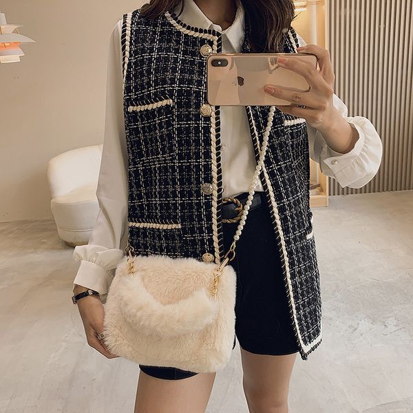 evening bags plush tote pearl chain bag for women winter soft fluffy solid furry luxury designer handbag fur shoulders 230831
evening bags plush tote pearl chain bag for women winter soft fluffy solid furry luxury designer handbag fur shoulders 230831