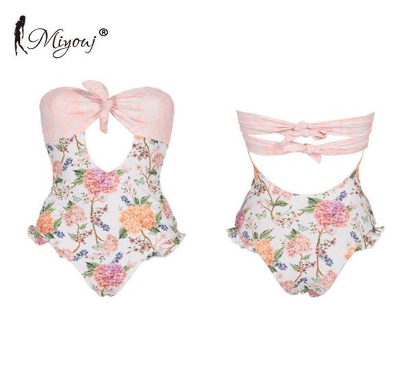 miyouj bandeau one piece swimsuit ruffle floral swimwear bandage bathing suit women hollow out biquini feminino 2019 bikini y8670512, White;black 
miyouj bandeau one piece swimsuit ruffle floral swimwear bandage bathing suit women hollow out biquini feminino 2019 bikini y8670512, White;black
