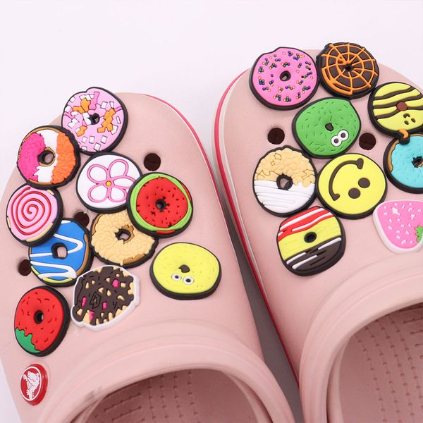 wholesale 100pcs pvc delicious donuts food sandals buckle shoe charms boys girls decorations for button clog backpack, White;pink
wholesale 100pcs pvc delicious donuts food sandals buckle shoe charms boys girls decorations for button clog backpack, White;pink