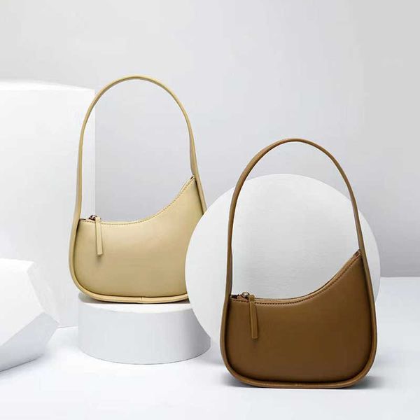 the rowbag cowhide handbag niche designer tote bag texture genuine leather shoulder bags irregular portable underarm womens bag 230831
the rowbag cowhide handbag niche designer tote bag texture genuine leather shoulder bags irregular portable underarm womens bag 230831