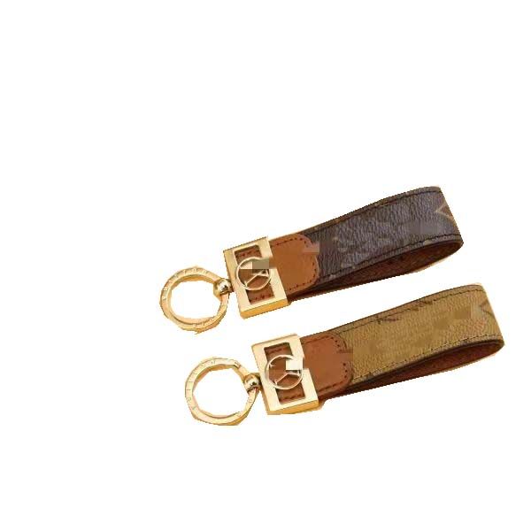 the design is a new key chain pendant high-end couples with the same fashion brand key chain short, Silver
the design is a new key chain pendant high-end couples with the same fashion brand key chain short, Silver