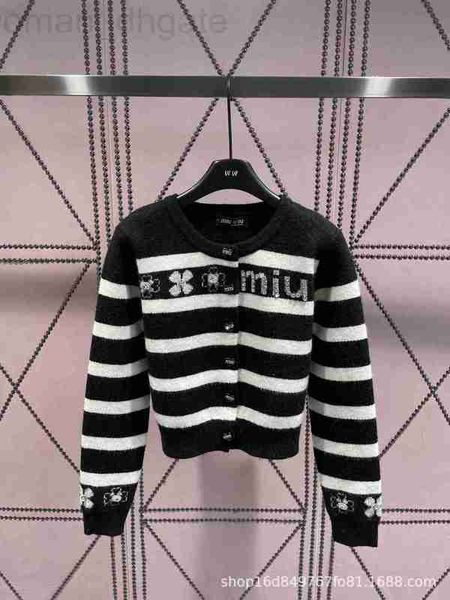 womens sweaters designer early autumn new nail diamond knitted cardigan love button front and back craft fashionable, White;black
womens sweaters designer early autumn new nail diamond knitted cardigan love button front and back craft fashionable, White;black