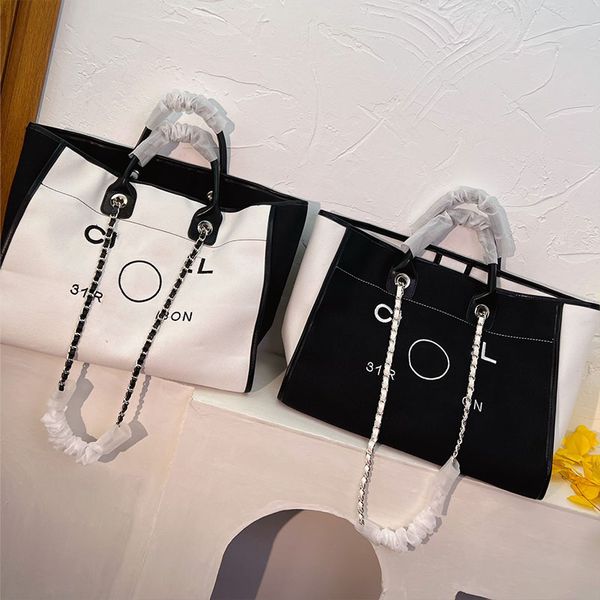 22ss womens jumbo shopping beach bag handle matelasse chain crossbody shoulder handbag large capacity designer outdoor sacoche pocket 30x40c
22ss womens jumbo shopping beach bag handle matelasse chain crossbody shoulder handbag large capacity designer outdoor sacoche pocket 30x40c