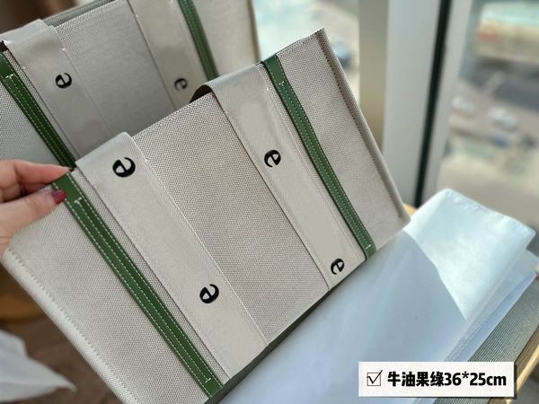 23ss luxury designer totes women woody canvas tote bag large capacity shopping bags fashion famel handbags
23ss luxury designer totes women woody canvas tote bag large capacity shopping bags fashion famel handbags
