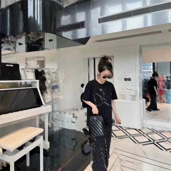 black two piece pants custom logo printed crewneck short sleeve t-shirt luxury ironing drill decoration elastic waist personality pants trac, White
black two piece pants custom logo printed crewneck short sleeve t-shirt luxury ironing drill decoration elastic waist personality pants trac, White
