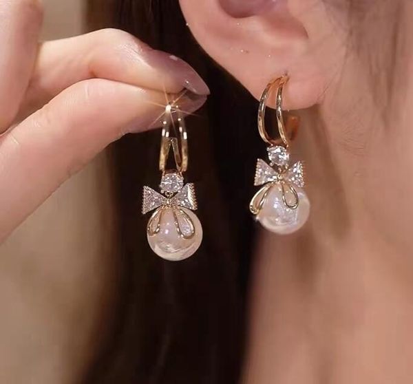 trend crystal zircon bow pendant earrings for women party girl imitation pearl dangle earrings luxury wholesale jewelry gc1943, Silver
trend crystal zircon bow pendant earrings for women party girl imitation pearl dangle earrings luxury wholesale jewelry gc1943, Silver
