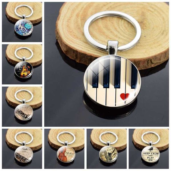 key rings musical instrument piano guitar clarinet flute music double face glass cabochon keychain music note metal keyring christmas gift r, Slivery;golden
key rings musical instrument piano guitar clarinet flute music double face glass cabochon keychain music note metal keyring christmas gift r, Slivery;golden