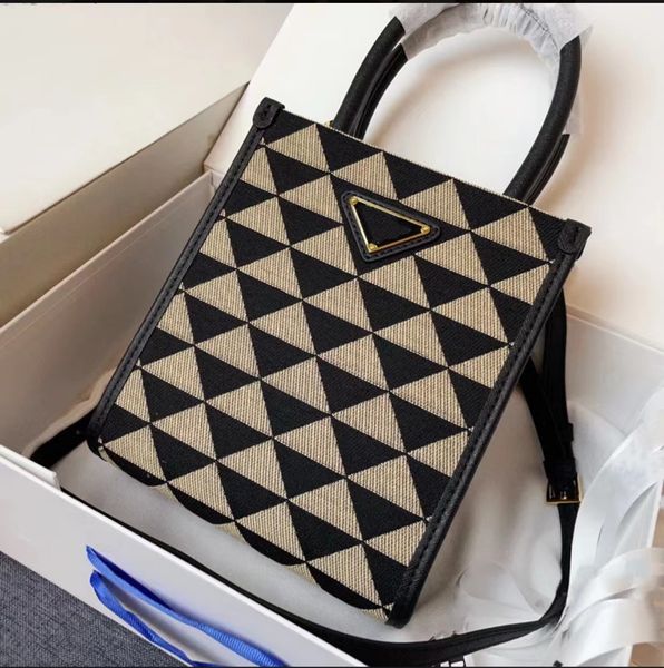 mini saffiano crossbody bag embroidery fabric totes with triangle mark long leather strap women designer handbag
mini saffiano crossbody bag embroidery fabric totes with triangle mark long leather strap women designer handbag