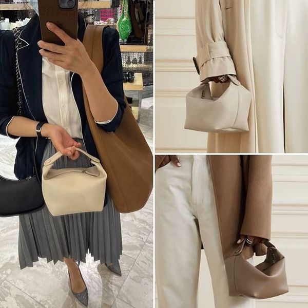 the row designer handbag lunch box bag cowhide lady handheld small square female white bag
the row designer handbag lunch box bag cowhide lady handheld small square female white bag