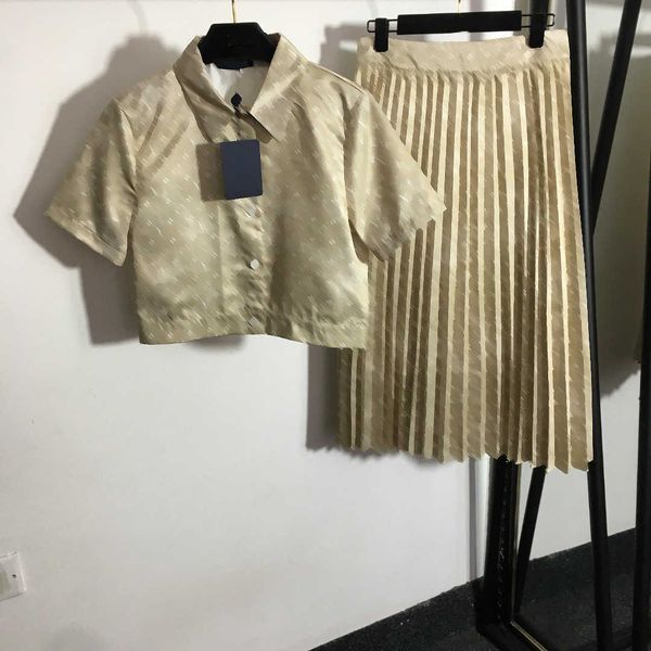 23ss brand designer women shirts skirts set logo printed short sleeve shirt high waist pleated half skirt set womens clothing, White
23ss brand designer women shirts skirts set logo printed short sleeve shirt high waist pleated half skirt set womens clothing, White