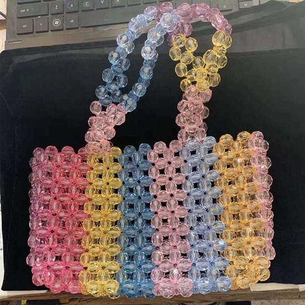 american colorful striped corner bead large portable color mixed female bag shandong rainbow bag factory 230304
american colorful striped corner bead large portable color mixed female bag shandong rainbow bag factory 230304