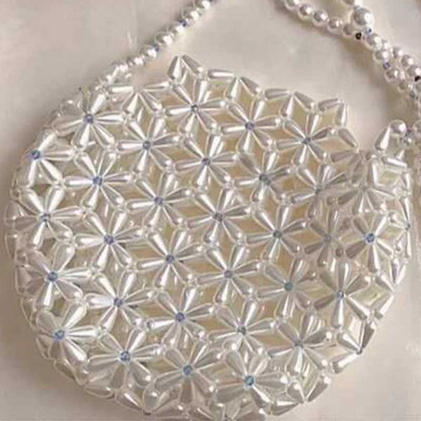 chrysanthemum round cross-body beauty beaded pearl bag octagonal rice fashion girl lipstick cosmetic 230304
chrysanthemum round cross-body beauty beaded pearl bag octagonal rice fashion girl lipstick cosmetic 230304