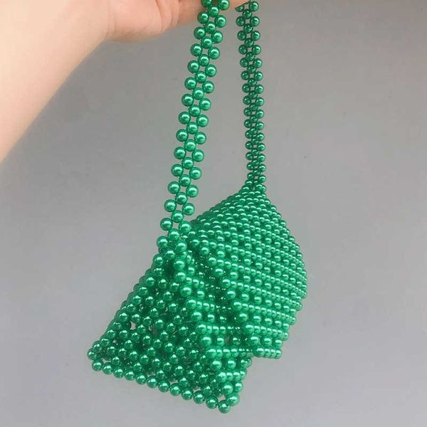 green pearl bag female street pretty girl handmade pearl color portable triangle three dimensional fashion sense 230304
green pearl bag female street pretty girl handmade pearl color portable triangle three dimensional fashion sense 230304
