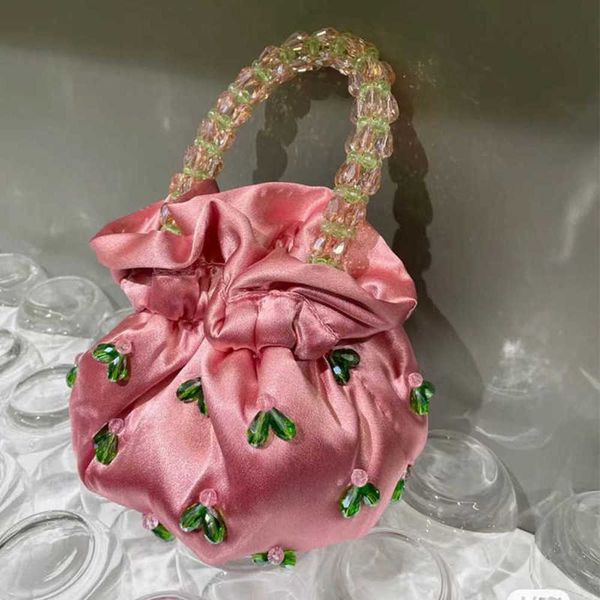 light green crystal water drop cloth bag hand bucket ins design sewn bead satin 230304
light green crystal water drop cloth bag hand bucket ins design sewn bead satin 230304