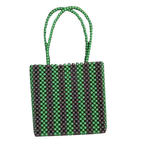 striped green and brown handmade beaded bag with vertical stripe beads portable women's flower dinner pull 230304
striped green and brown handmade beaded bag with vertical stripe beads portable women's flower dinner pull 230304
