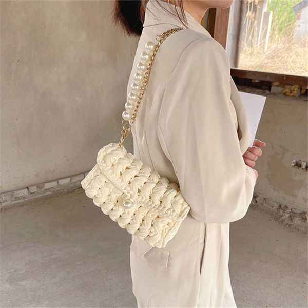 woolen knitted braid handbag crochet shoulder bags women hand-woven pearl shoulder strap bag wool vacation casual tote travel 230304
woolen knitted braid handbag crochet shoulder bags women hand-woven pearl shoulder strap bag wool vacation casual tote travel 230304