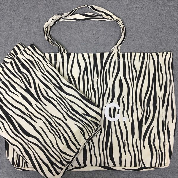 lotte japan korea zebra fashion leisure shopping bag handbag one shoulder portable canvas bagap
lotte japan korea zebra fashion leisure shopping bag handbag one shoulder portable canvas bagap