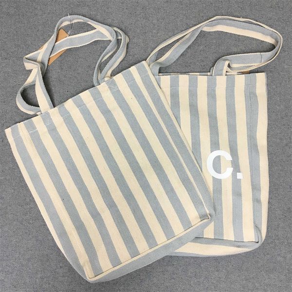 lotte japan korea vertical stripe shopping bag handbag shoulder bag handbag canvas bagap
lotte japan korea vertical stripe shopping bag handbag shoulder bag handbag canvas bagap