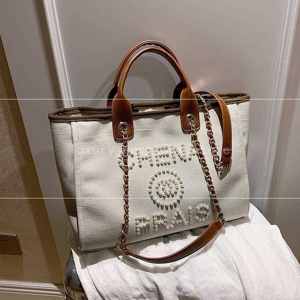 fashion women's designer's new luxury canvas luxury messenger large volume one shoulder tote bags handbags women g220601
fashion women's designer's new luxury canvas luxury messenger large volume one shoulder tote bags handbags women g220601