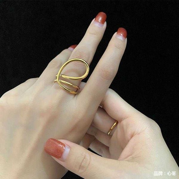 cluster rings new 2022 punk hip-hop big irregular finger rings for women men gold silver color metal line special personality ring gift l230, Golden;silver
cluster rings new 2022 punk hip-hop big irregular finger rings for women men gold silver color metal line special personality ring gift l230, Golden;silver